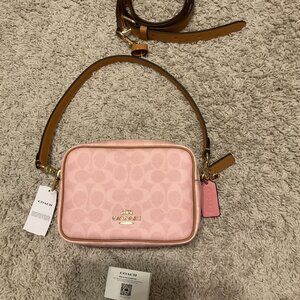 Coach mini carey crossbody Bag In Signature Canvas With Charms Gold/ powder pink